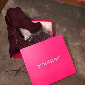 Knee high heeled boots